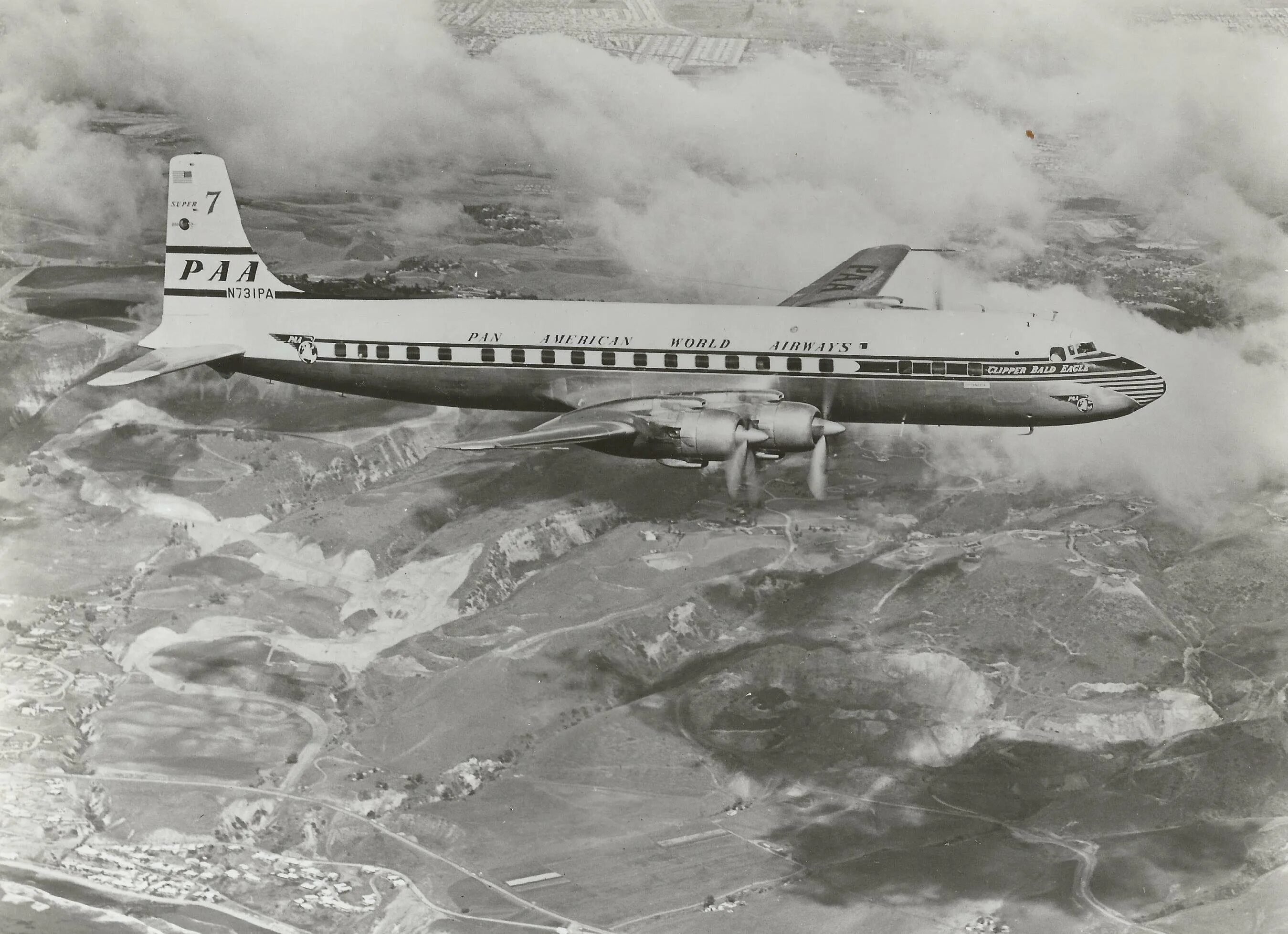 Dc 7.4. Douglas DC-7c. DC-7 самолет. Дуглас DC-7. Самолет dc7c Pan American.