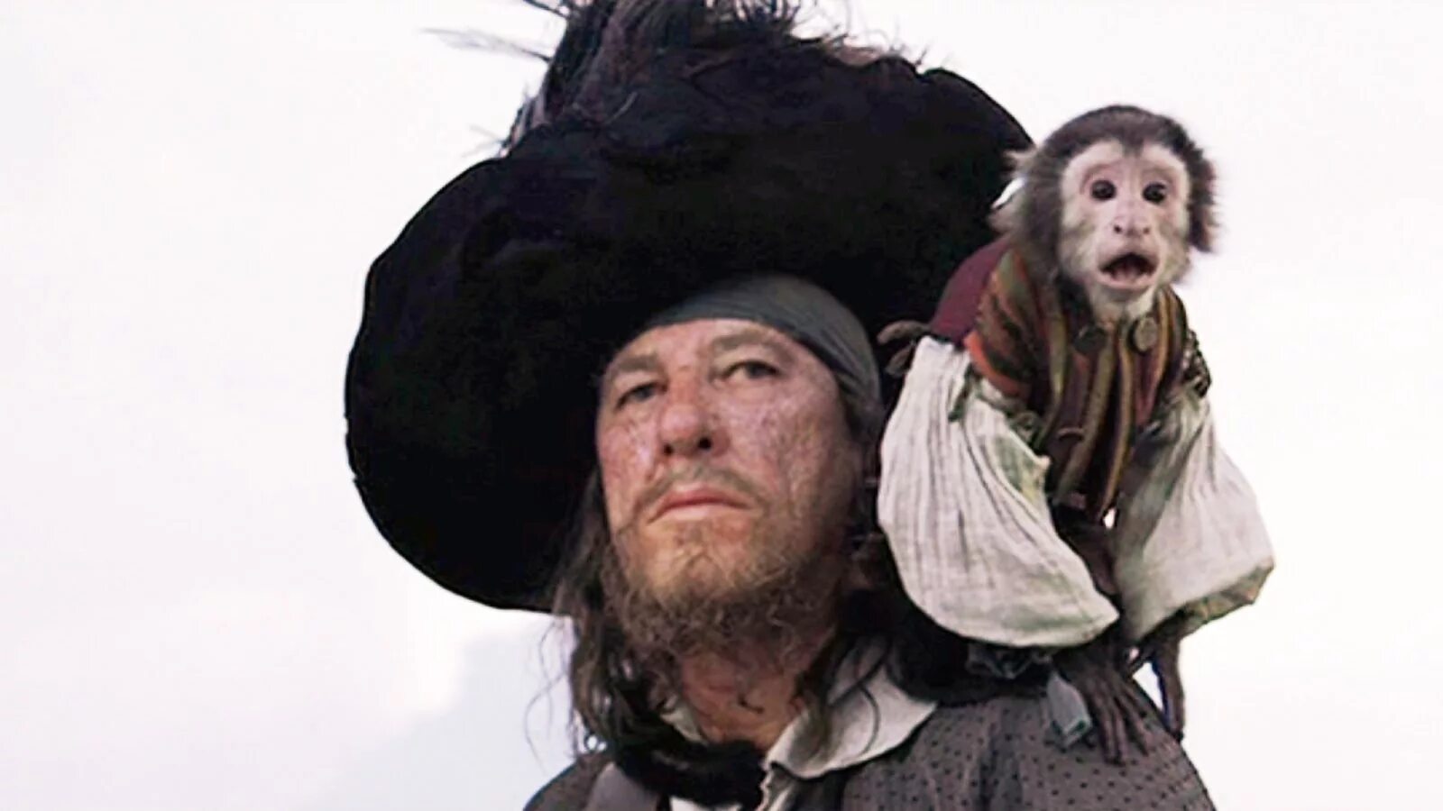 Обезьяна джек. Капитан Барбосса с обезьянкой. Джек обезьяна Барбосса. Барбосса с мартышкой. Обезьянка Джек из пиратов Карибского моря.