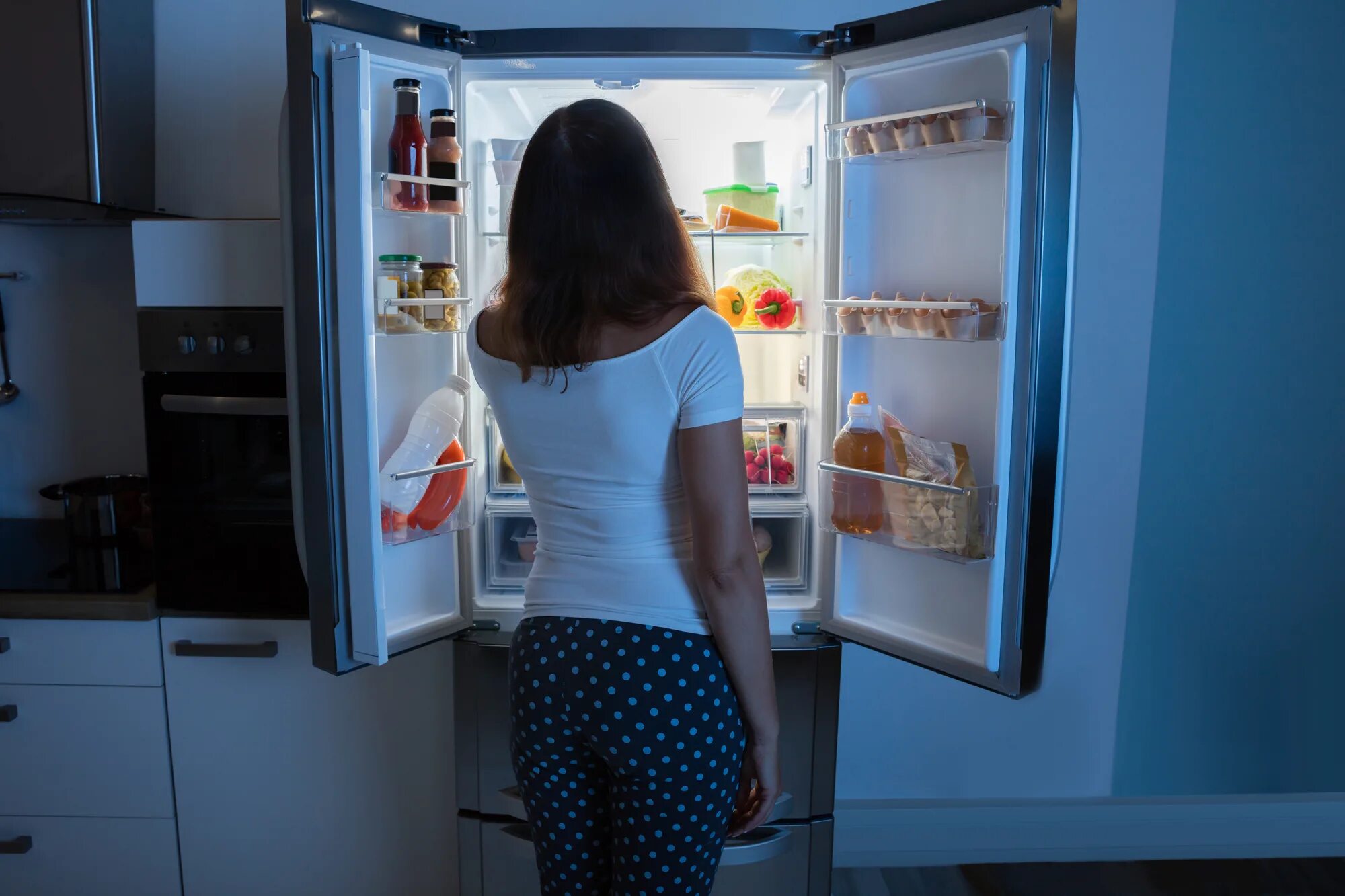 Next to the fridge