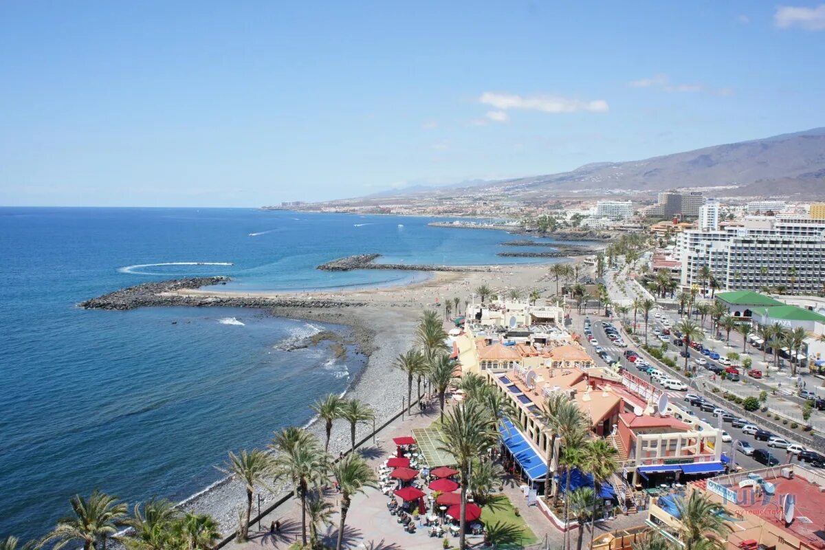 Playa de las americas тенерифе. Пляж дюк тенерифе. Тенерифе las americas. Тенерифе америкас. Набережная плайя де лас америкас.