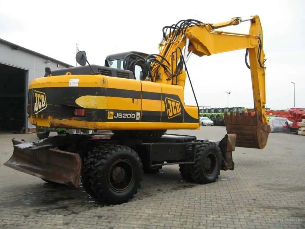 Jcb js200. Колесный экскаватор jcb js200w. экскаватор jcb js200w. экскаватор полноповоротный jcb js200w. js200.