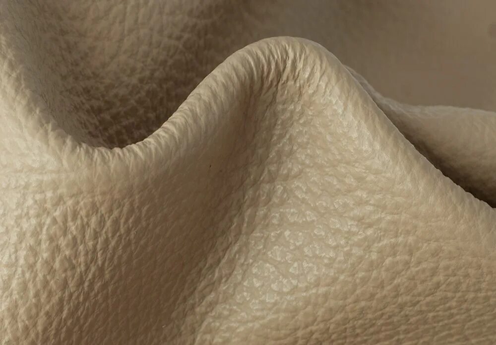 кожзаменитель для мебели. Status 10 ткань. однотонная кожа. покрывает кожу ткань. фактура кожи человека.