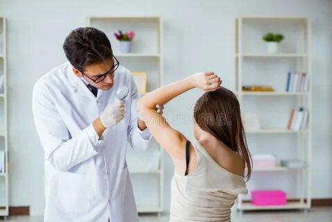 The doctor was examining him the