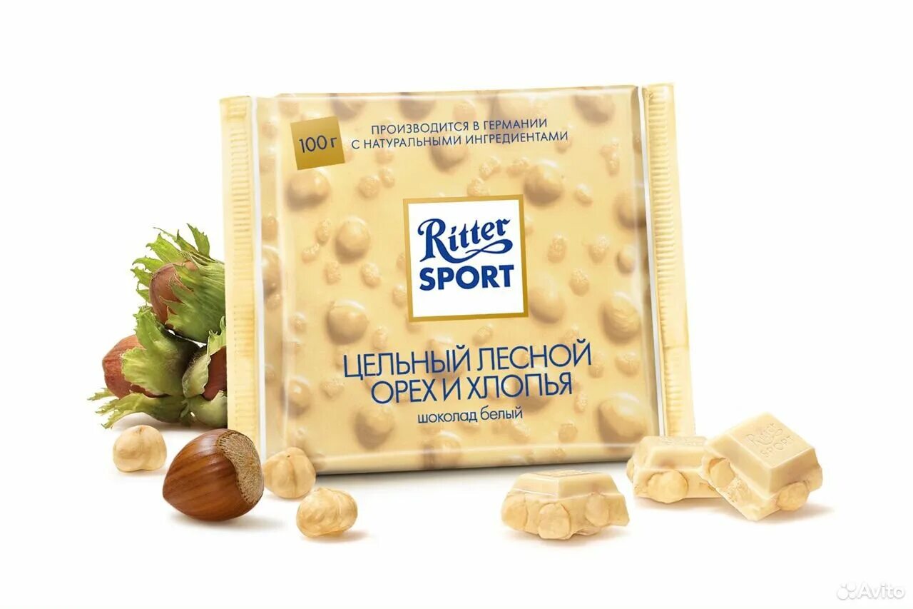 Шоколад орех ritter sport. Шоколад Ritter Sport цельный Лесной орех и хлопья белый 100 г. Ritter Sport шоколад белый орех хлопья 100г. Шоколад Риттер спорт белый с цельным лесным орехом и хлопьями 100г. Шоколад Риттер спорт белый с орехами и хлопьями.