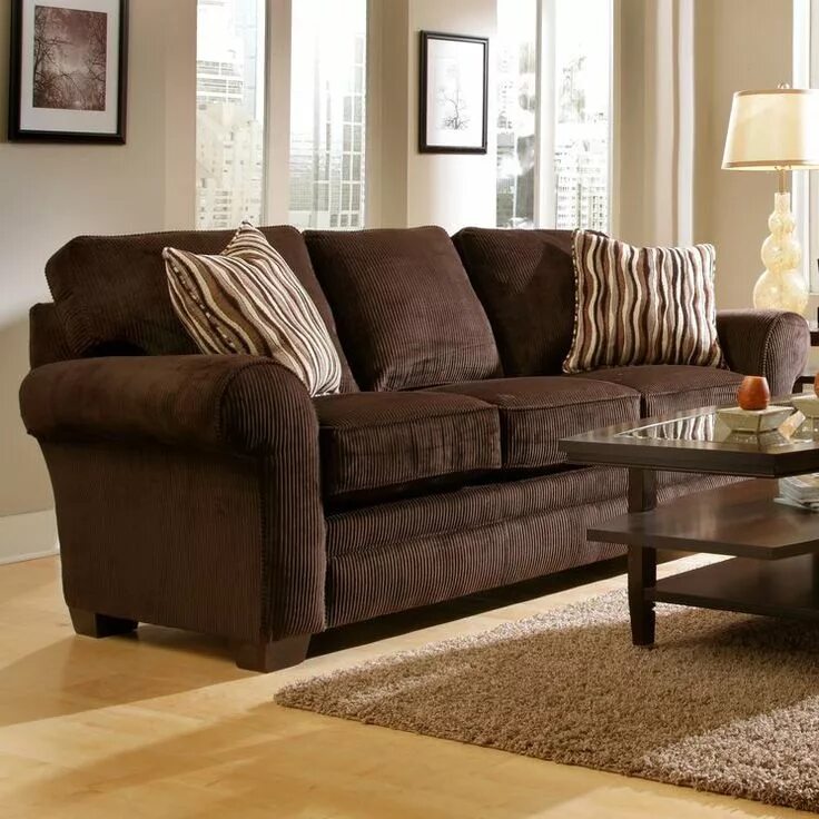 Have spent many a nights on this couch :) Brown and blue living room, Living roo