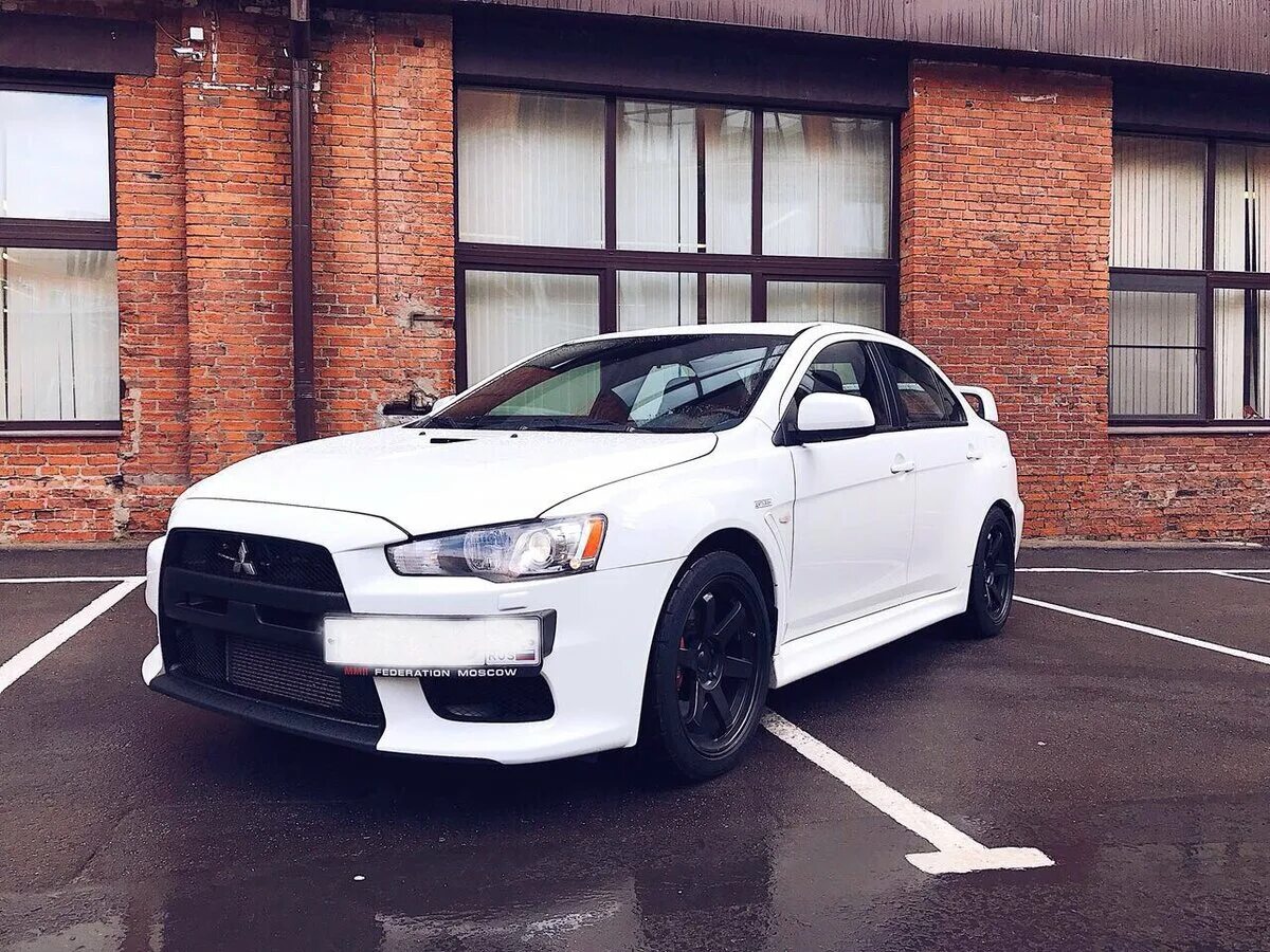 Mitsubishi белая. Mitsubishi Lancer Evolution 10 White. Митсубиши Лансер 10 белый. Mitsubishi Lancer EVO 10 белая. Mitsubishi Lancer Evolution x белый.