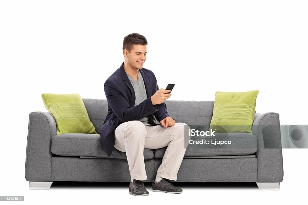 He is on the sofa