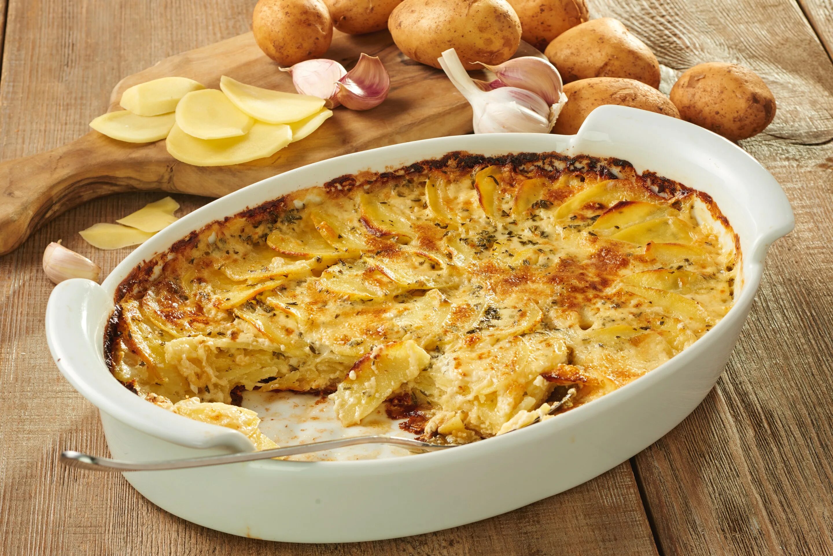 Гратен дофинуа. Гратен Дофинуа Gratin dauphinois. Картофель гратен Дофинуа. Французский картофельный гратен.