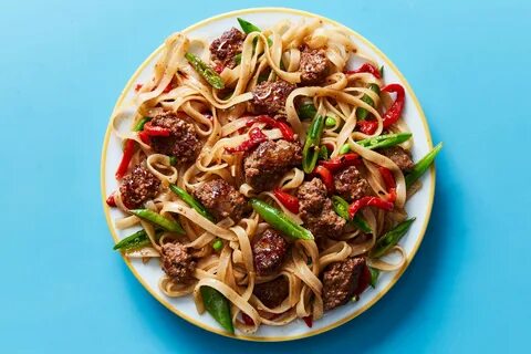 Lean pork and sweet peppers on noodles bef