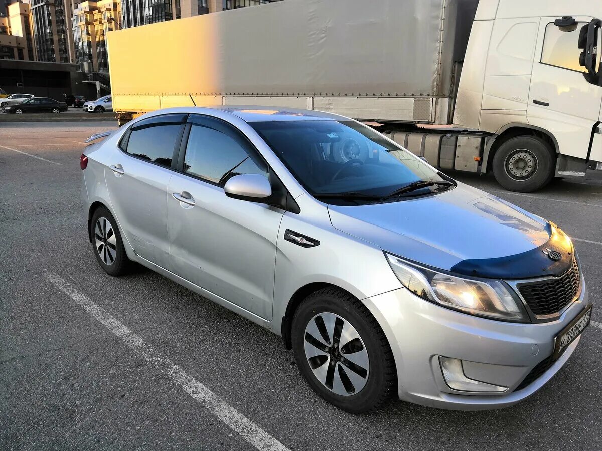 Купить кия новосибирск. Kia Rio III 2012. Киа Рио 3 седан 2012. Киа Рио 2012 седан. Kia Rio 3 и 4.