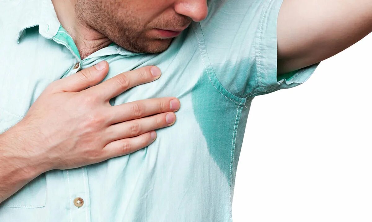 Почему повышенная потливость. Потные подмышки. потливость подмышек. повышенное потоотделение. вспотел в рубашке.