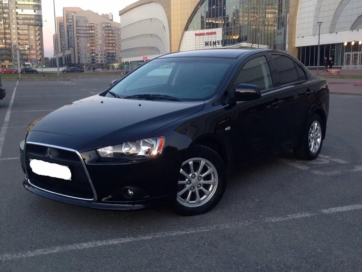 Mitsubishi lancer 2012. Митсубиси Лансер 10 Рестайлинг черный. Mitsubishi Lancer 10 Рестайлинг черный. Мицубиси Лансер 2012. Mitsubishi Lancer x 2012.