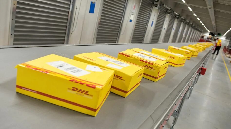 DHL Express автоматизация. DHL магазин. Тележки DHL. DHL package. Helion dhl 6