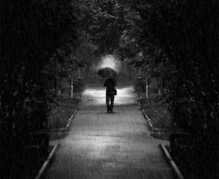 The rain falls. Alone. walk in rain gif. alone walking guy gif. left me in the rain.