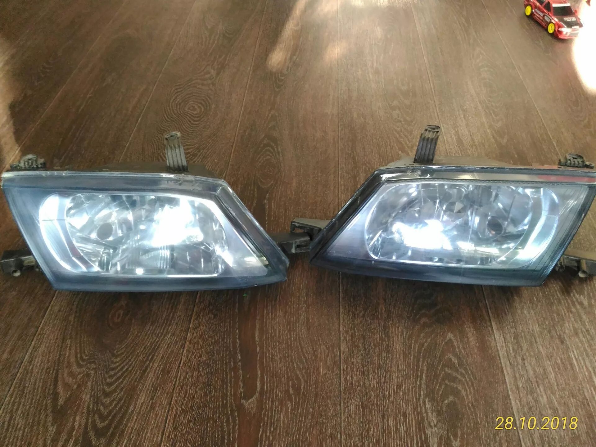 Фара левая nissan wingroad y11. Фара ниссан вингроад y11. Фары nissan wingroad y11. Wingroad y11 rider. Фары противотуманные ниссан вингроад y11.