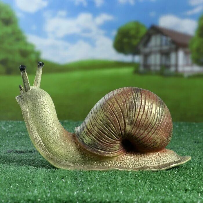 топиари улитка. садовая фигурка улитка. улитка садовая фигура. зелёная улитка малайзия. садовая улитка.