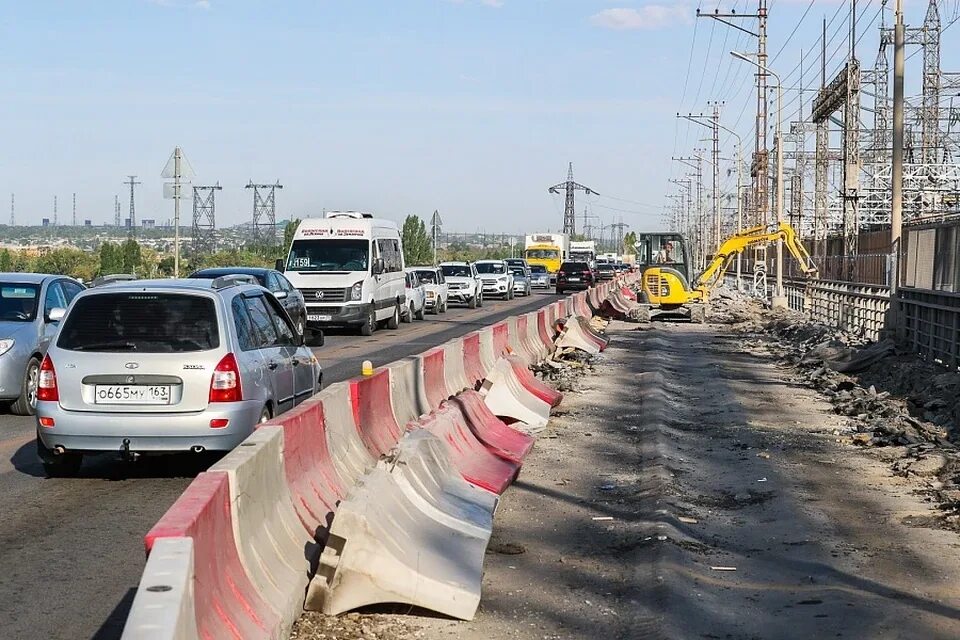 Курс на сегодня волжский. Мост через канал Бочаров Волгоград. Фото взорванного дорожного полотна Каховская ГЭС. Новости Волжского сегодня последние свежие. Что случилось на ГЭС Волжский сегодня.