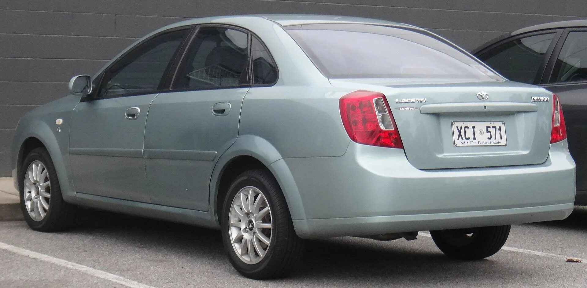 Машина похожая на шевроле. Daewoo Lacetti(j200). Дэу Лачетти j200. Daewoo Lacetti 2003. Lacetti седан (j200).