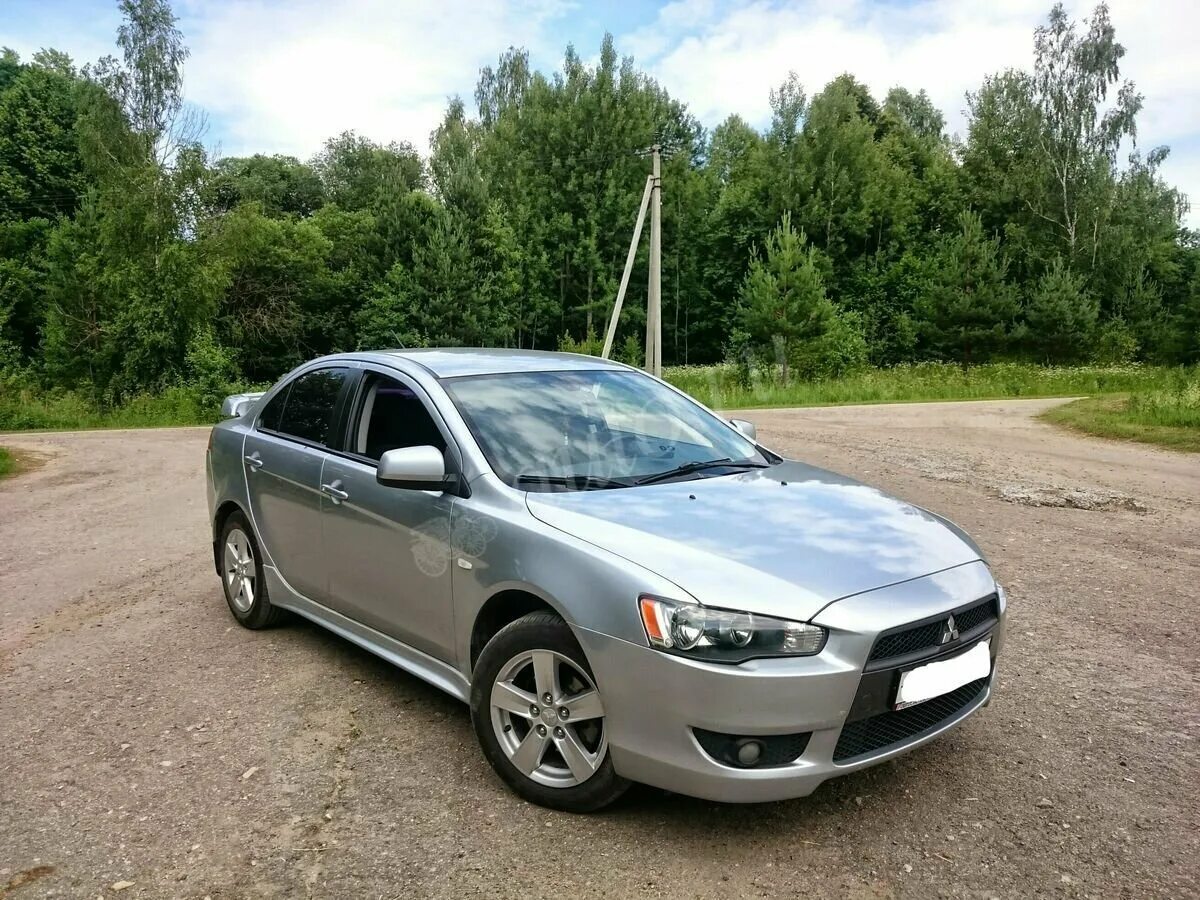 Мицубиси 10 года. Mitsubishi Lancer x 2008 Silver. Mitsubishi Lancer 10 серебристый. Mitsubishi Lancer 1.8 2008. Mitsubishi Lancer, 2008 серый.