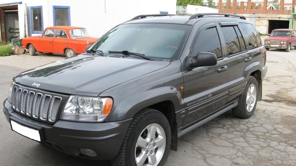 Jeep cherokee 2003 год система выхлопная. Джип 2003 года. Гранд чероки 2003. Гранд чероки 2003. Джип гранд чероки 2003 год.
