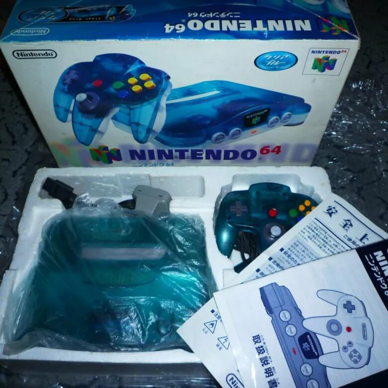 Nintendo 64 картриджи. Nintendo 64 синяя. Nintendo 64 коробка русская. Коробка от приставки Nintendo 64.