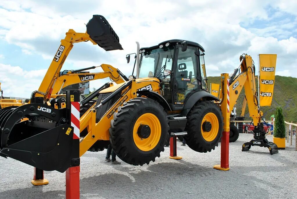 Экскаватор погрузчик казань. JCB 5cx погрузчик. Трактор JCB 5cx. Экскаватор-погрузчик JCB 5cx Eco. Погрузчик JCB 4cx.