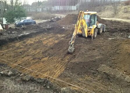 Земляные работы трактором