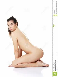 Naked woman kneeling stock image. 