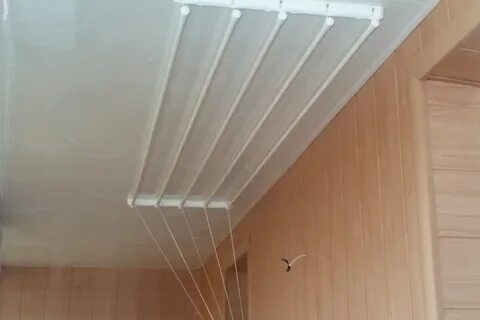 Монтаж сушилки для белья потолочной на балконе