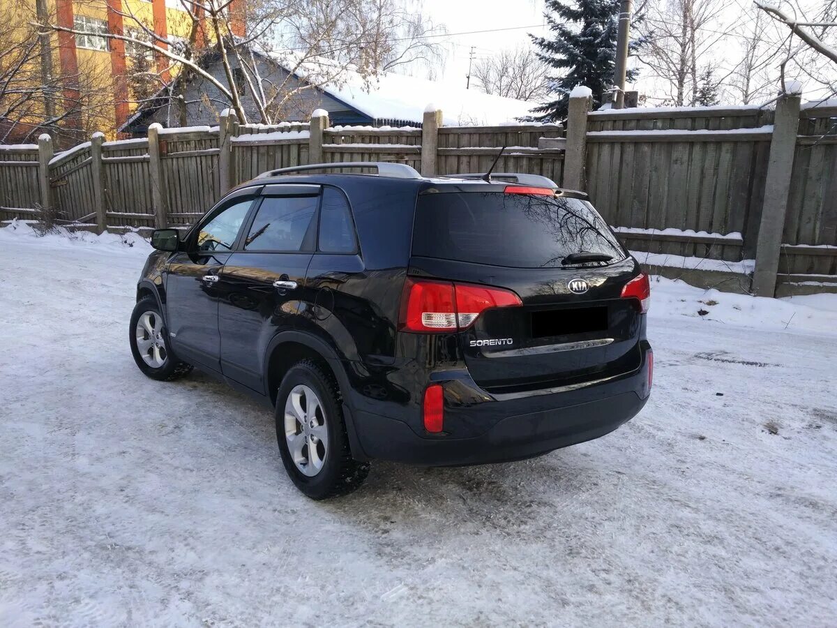 Купить киа соренто в нижнем новгороде. Киа Соренто 2 Рестайлинг черный. Kia Sorento 2014 Black. Черный Киа Соренто 2014 года. Киа Соренто 2012 черный.