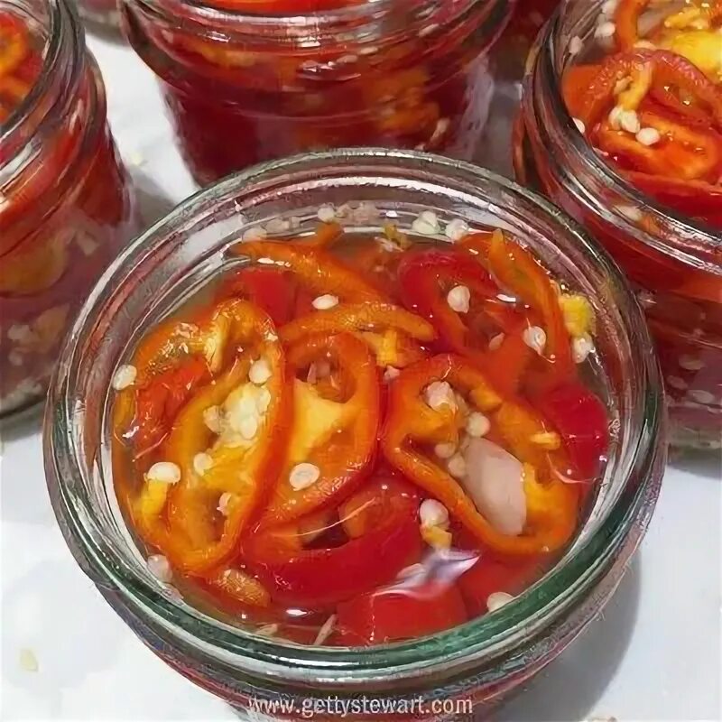 Острый перец на зиму колечками. Маринованные острые перцы. перец острый маринованный. перец горький маринованный колечками. острый перец колечками на зиму.