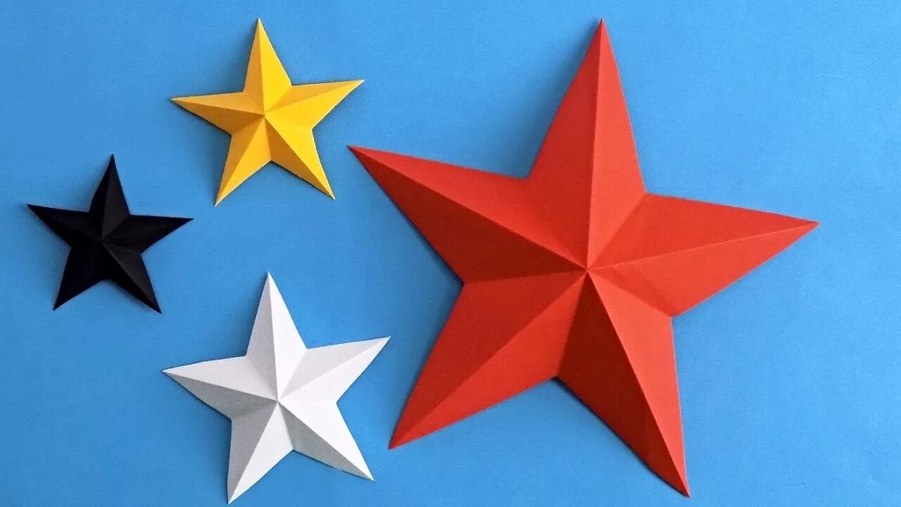 Сделать звезду из бумаги на 9. Пятиконечная звезда оригами. Оригами звезда четырехконечная. Объемная звезда из бумаги. Оригами звезда из бумаги.