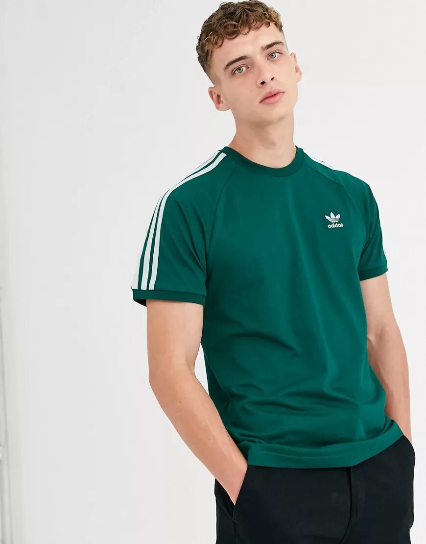 Adidas originals футболка 3-stripes tee. Футболка адидас зеленая мужская. Темно зеленая футболка адидас. Футболка адидас зеленая мужская. Футболка адидас зеленая мужская.