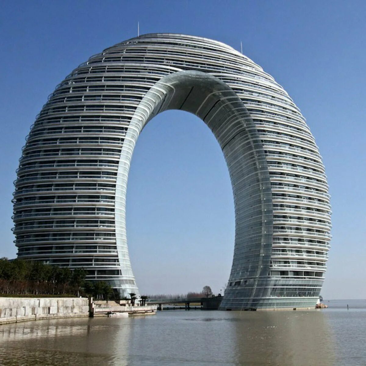 Невероятное количество. Архитектура Шератон Хучжоу. Отель Sheraton Huzhou, Китай. Отель «Шератон Хучжоу», Хучжоу, Китай. Здание отеля Sheraton в Хучжоу.