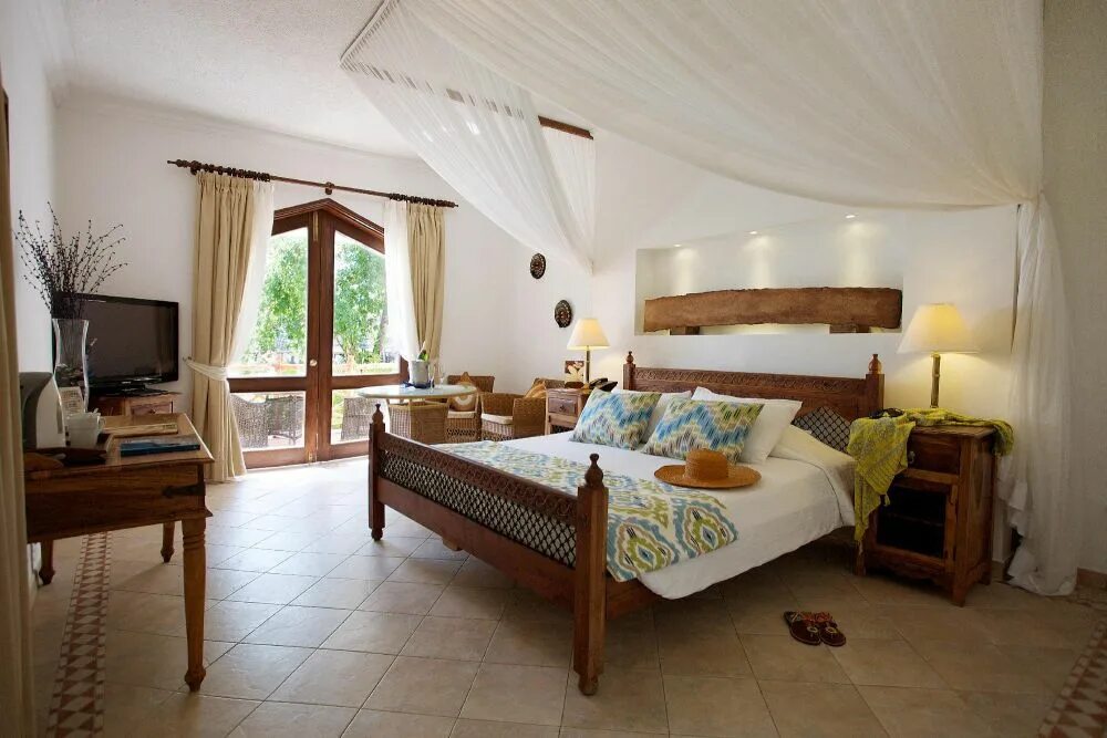 Bay beach resort 5. BLUEBAY Beach Resort Spa Zanzibar. Blue Bay Beach Resort 5 Занзибар. BLUEBAY Beach Resort and Spa 5 *****. Отель Zanzibar Bay Занзибар.