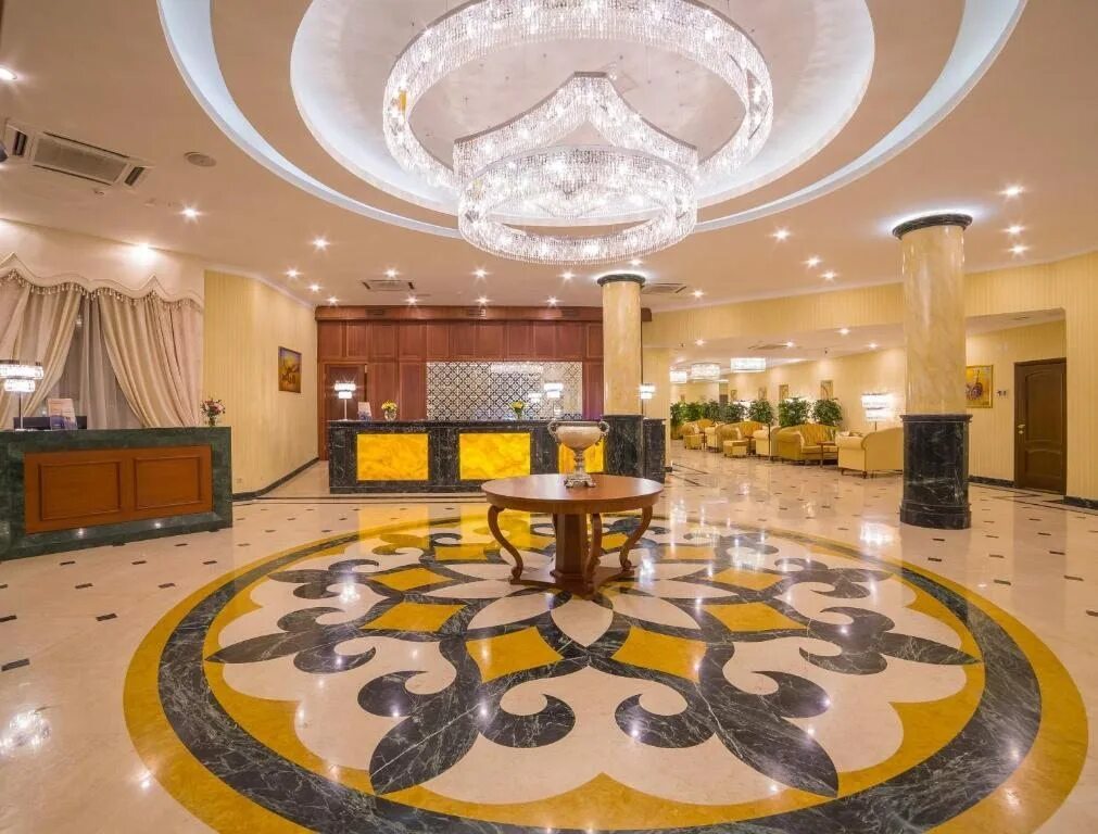 Almaty hotel. Виндхам Алматы отель. Ramada Алматы. Отель Рамада Казахстан. Гостиница Казахстан в Алматы.