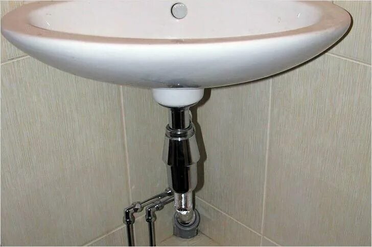 Как установить умывальник. Как установить умывальник. Труба под раковиной. Крепление для раковины тюльпан. Демонтаж тюльпана раковины.