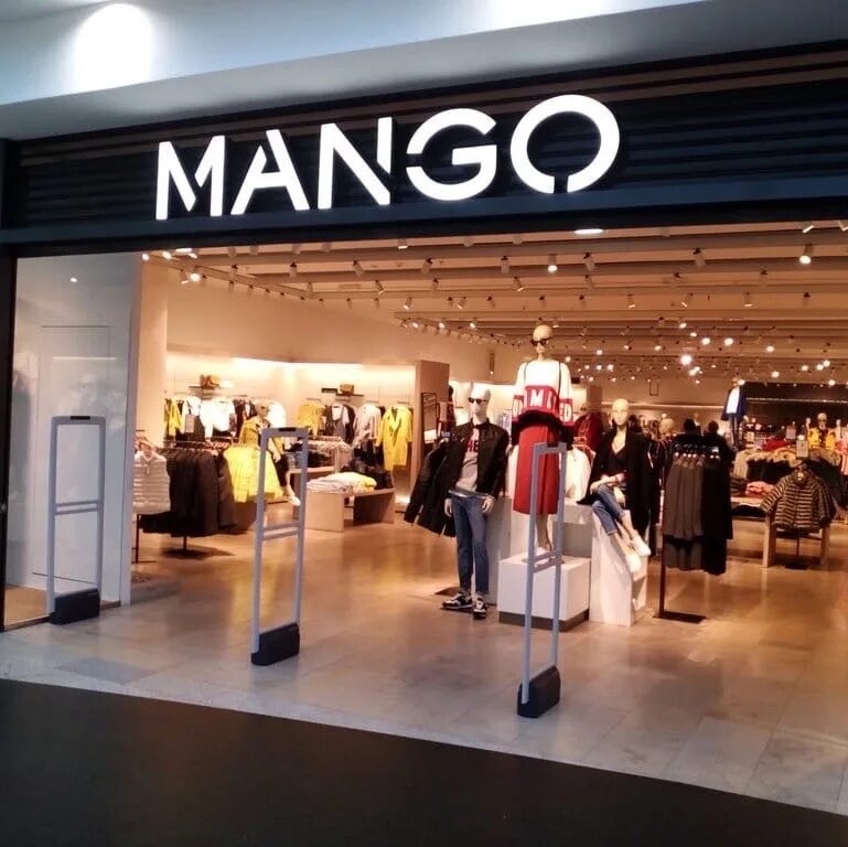 Компания манго. Манго бренд одежды. Mango магазин. Вывеска магазина манго. Манго магазин одежды.