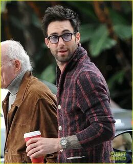Adam Levine....you wear glasses, you have facial hair, and you are covered in ta