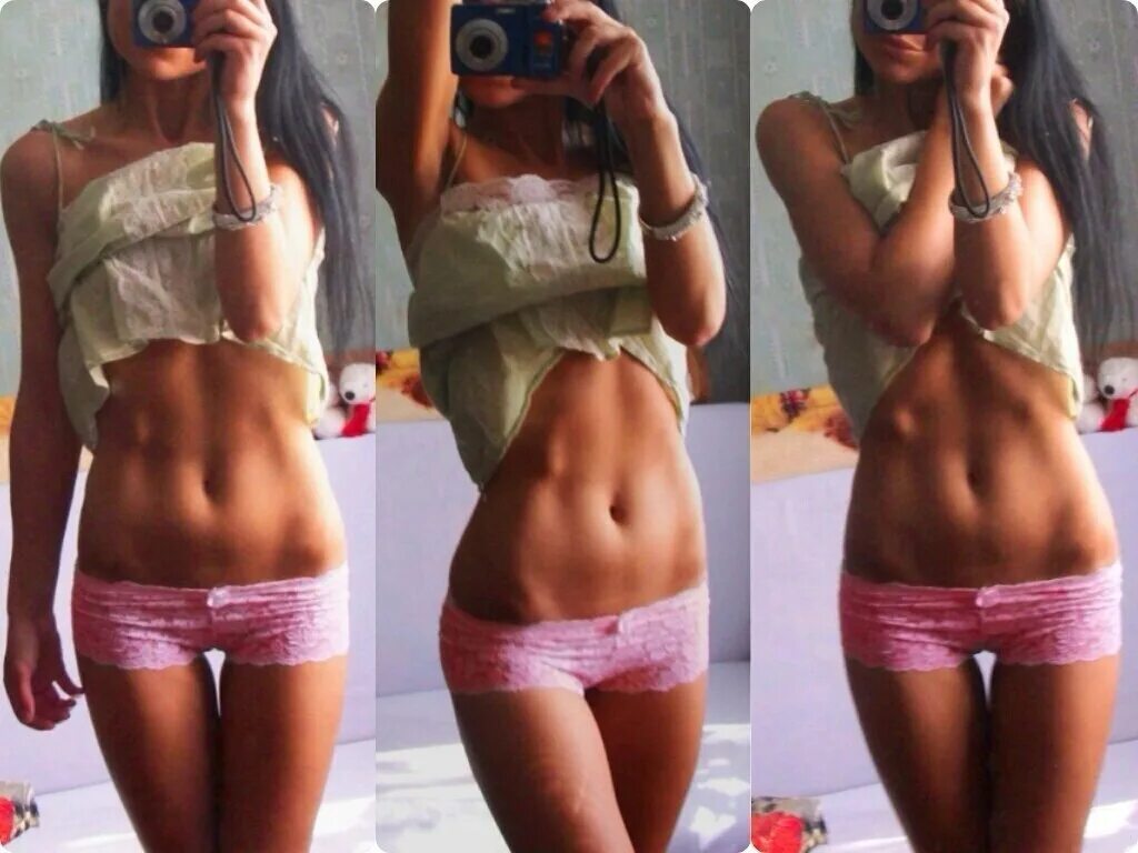 худая девушка с жирком. худой живот.