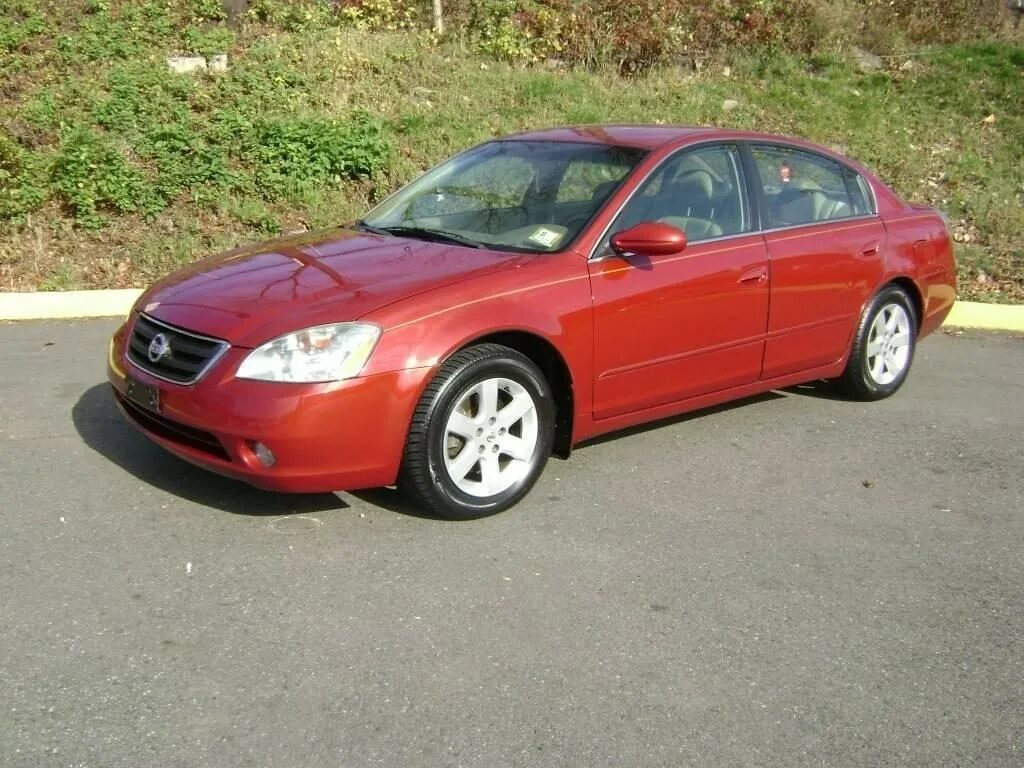 Ниссан 2003 фото. Ниссан алтима 2003. nissan altima s 2.5 2003г. ниссан альтима 2.5 2003 года. ниссан алтима 31.