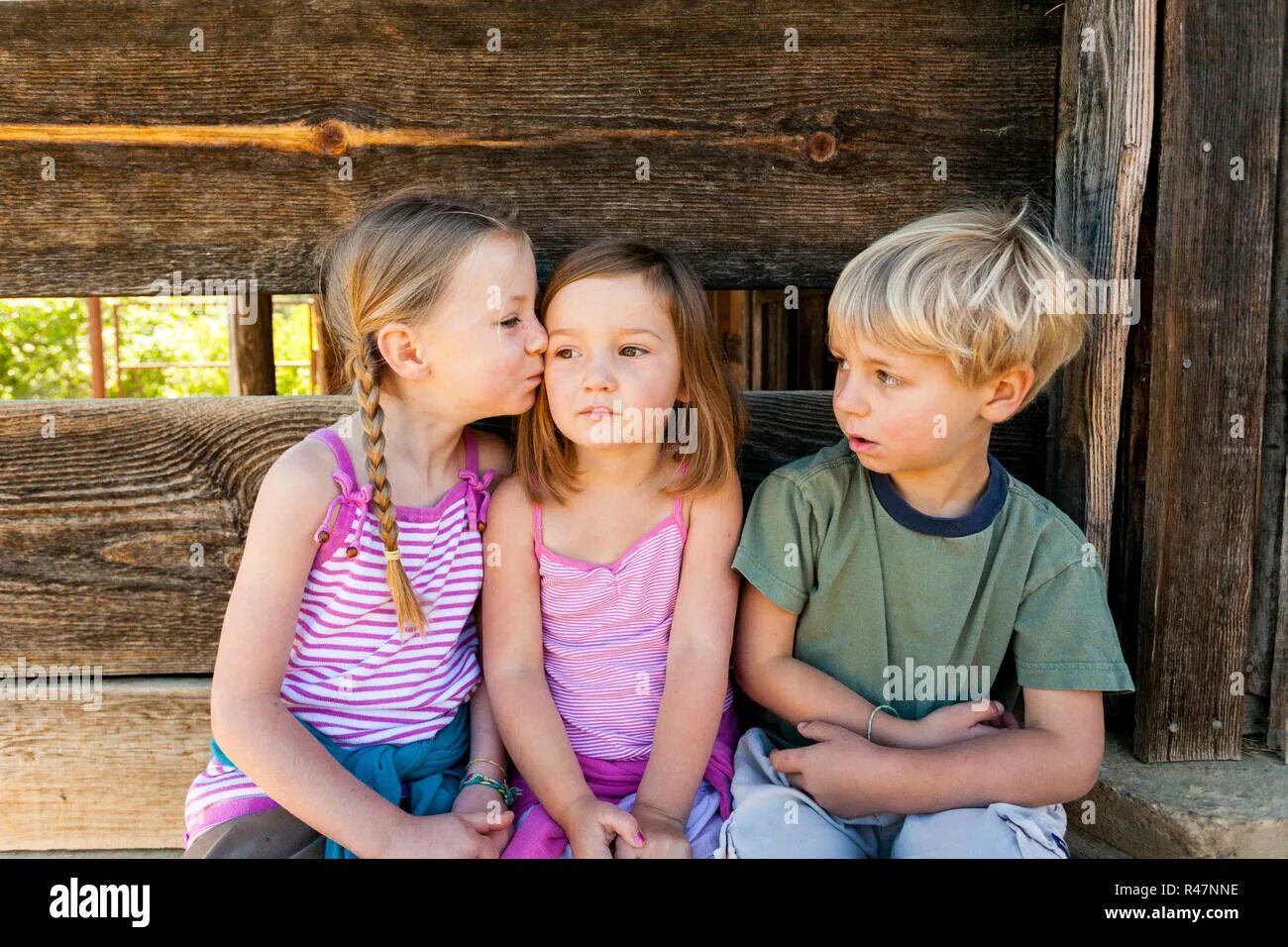 Little young girls private. Two brothers kissing Фотобанк Лори. Сестры Литл.. Два мальчика и одна девочка во дворе.