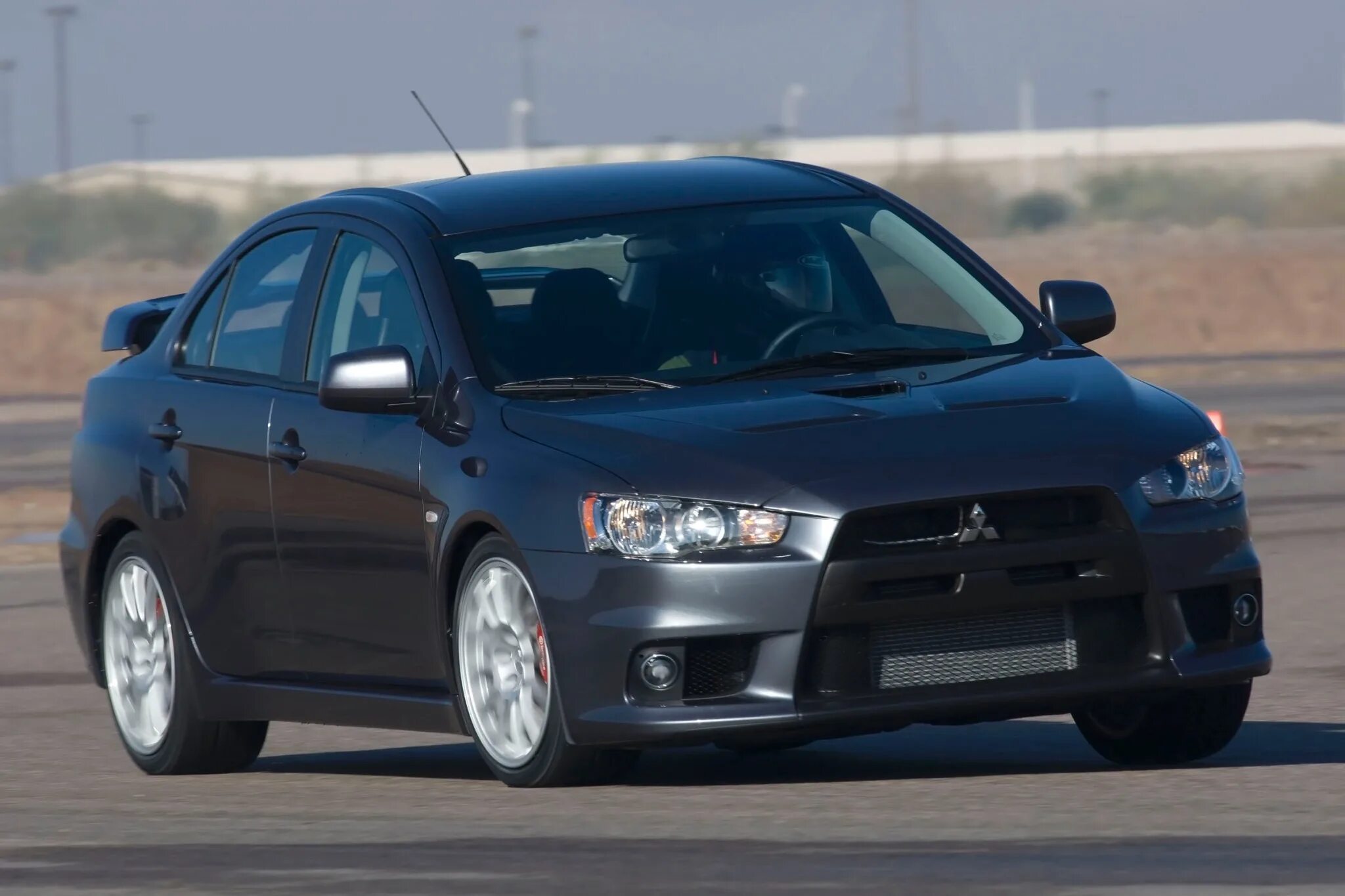 Митсубиси купить б лансер. Mitsubishi Lancer 2013. Митсубиси Лансер 2013. Mitsubishi Lancer Evolution 2013. Митсубиси Лансер Эволюшн 1.