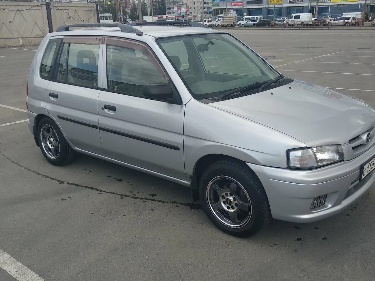 Mazda demio dw. Mazda Demio 1.3 at. Mazda Demio i (DW) 1999. Mazda Demio DW 1.3. Мазда Демио 1999 года 1.3.