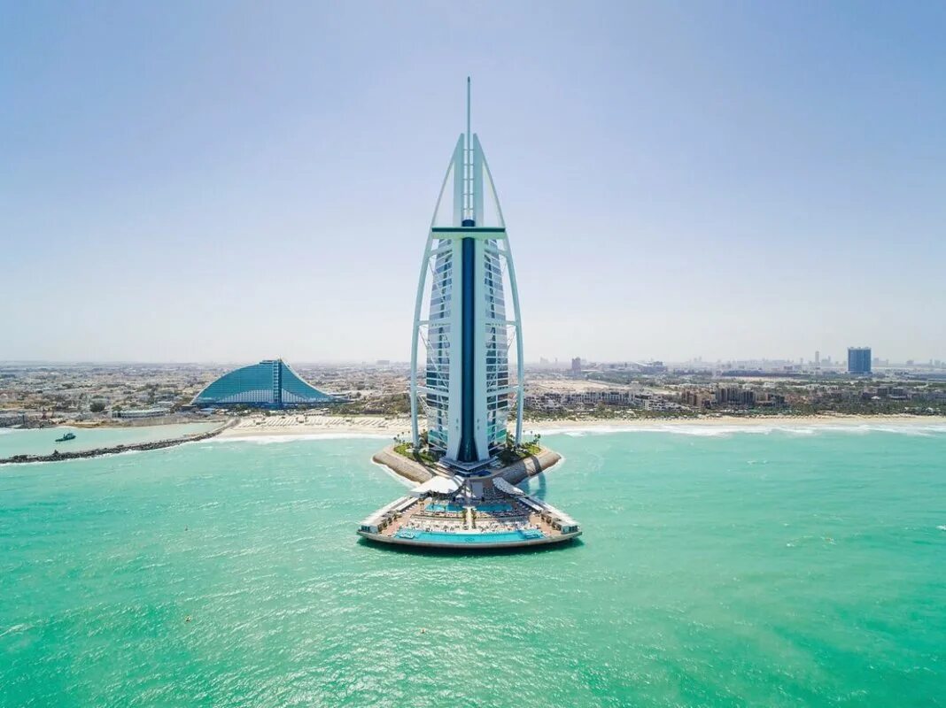 Бурдж аль араб. Бурдж Аль-араб - Джумейра. Дубай отель Burj al arab Jumeirah. Отель Парус в Дубае крест. Отель Бурдж Аль араб мост.