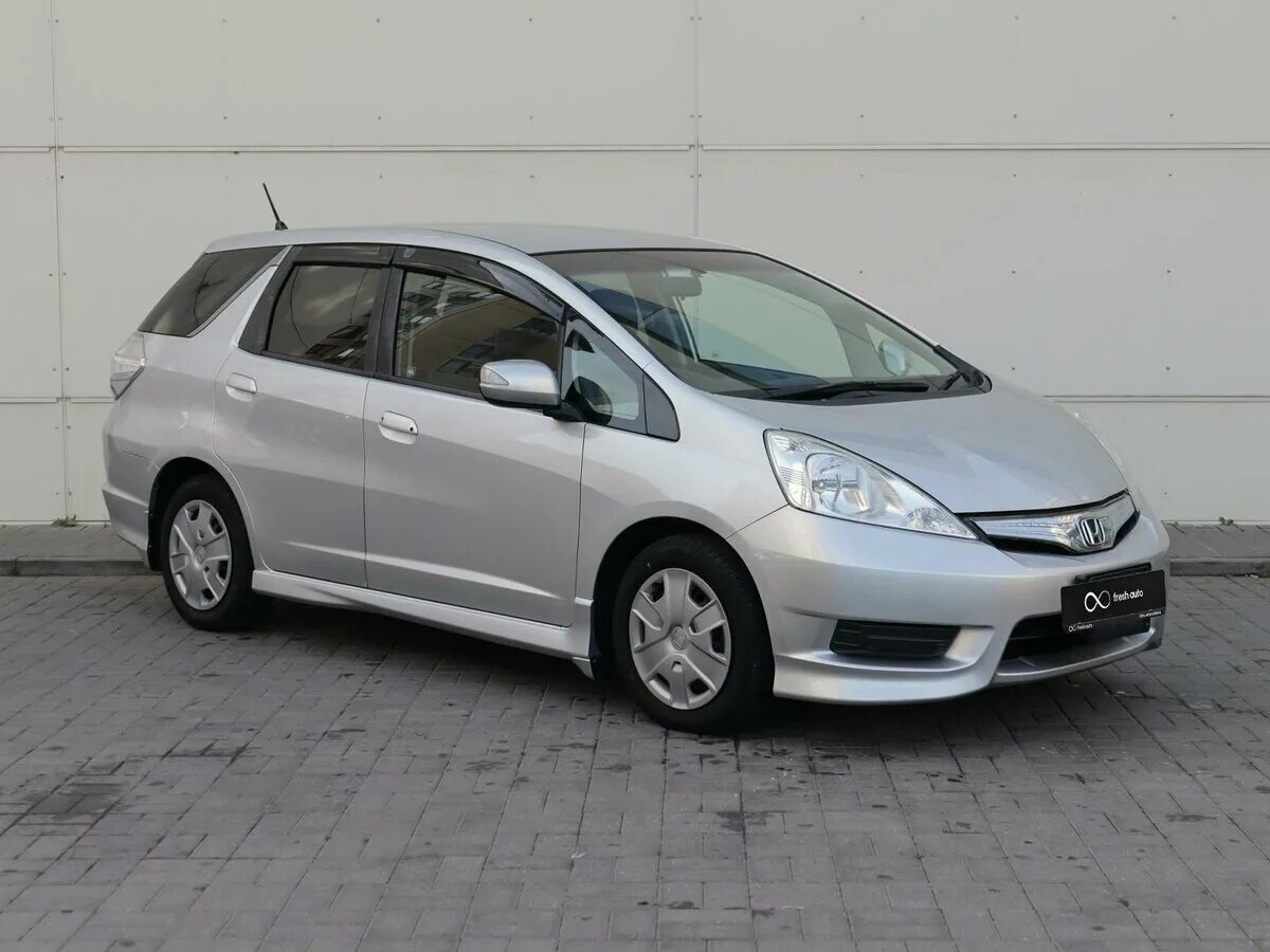 Фит шаттл 2011 год. Honda Fit Shuttle 2011. Хонда фит шаттл гибрид 2011. Хонда Fit Shuttle 2011г. Honda Fit Shuttle 2022.