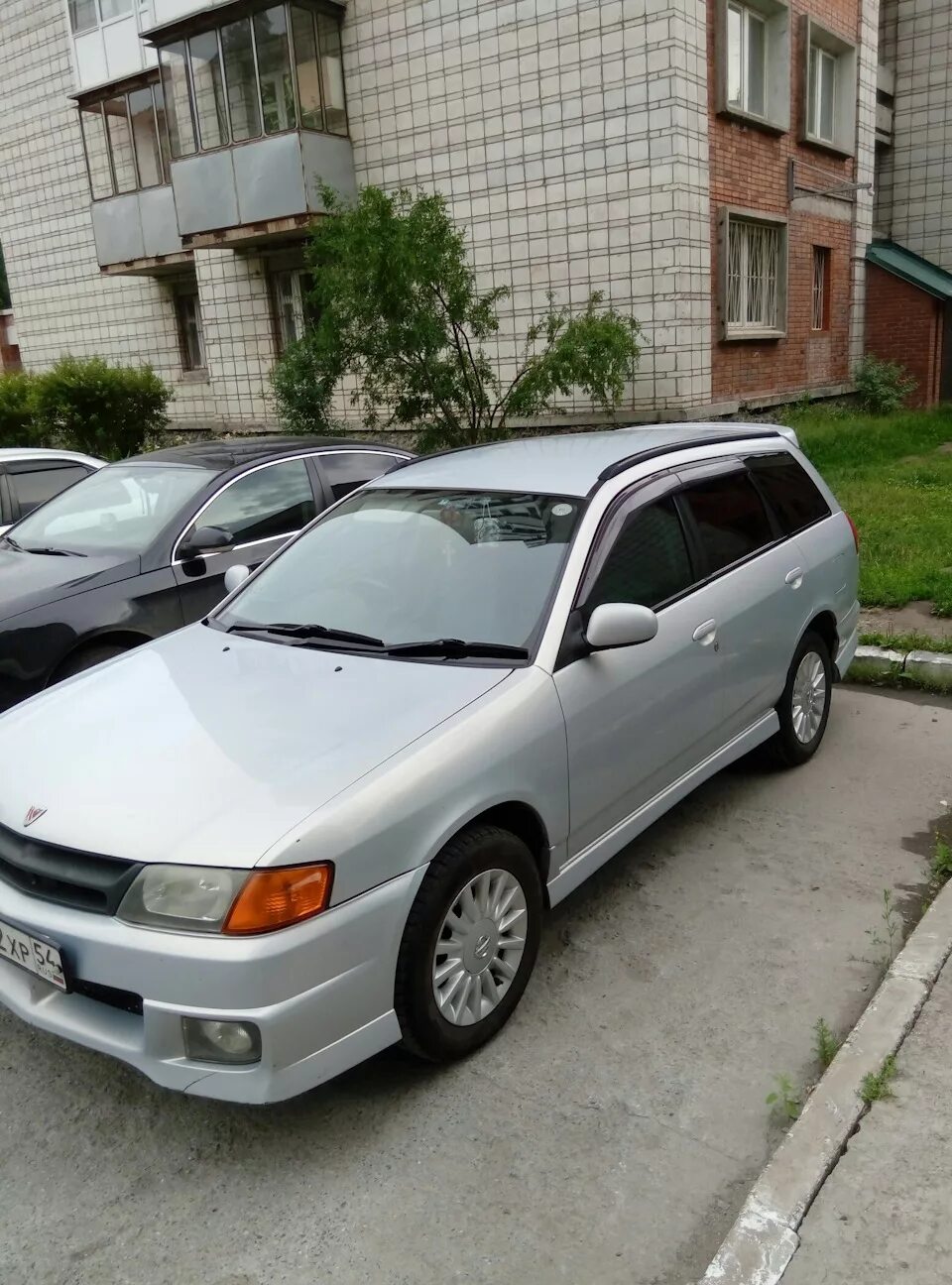 Nissan wingroad 2000 года. Ниссан вингроуд 2001. Ниссан Вингроад 2001. Nissan Wingroad y11 2001. Nissan Wingroad II (y11) Рестайлинг.