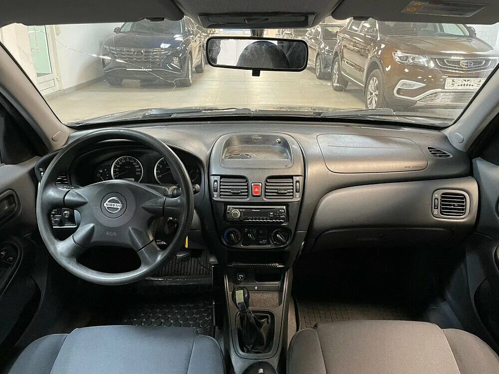 Альмера стоит ли. Nissan Almera 2005. Nissan Almera 2005 салон. Ниссан Альмера 2005 салон. Nissan Almera Classic 2005.