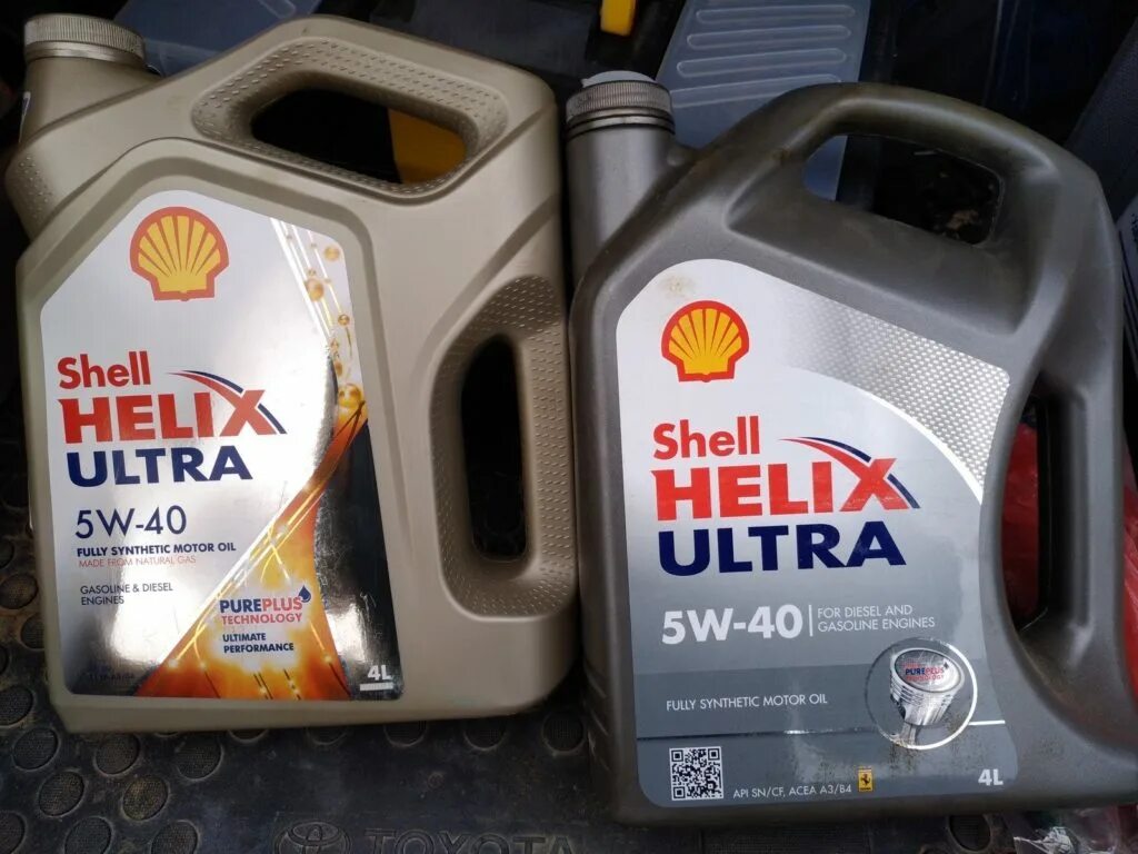 Шелл хеликс подлинность. Shell Helix Ultra VW 502 00/505 00 5w40. Shell Helix Ultra 0w-40 API SN. Канистра Шелл Хеликс ультра 5w40. Масло Шелл 5 40.