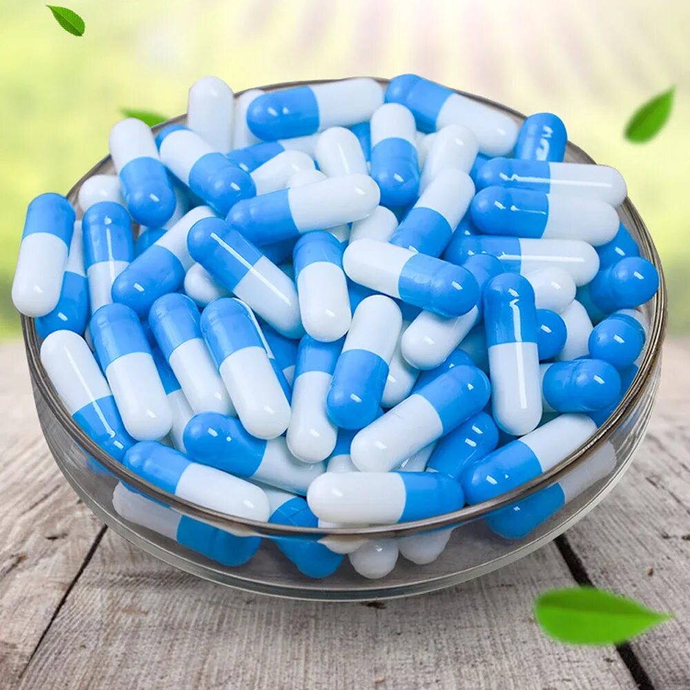 Плотная капсула. Таблетки капсулы. Капсулы бело голубые. Капсулы лекарства. Пустые капсулы.